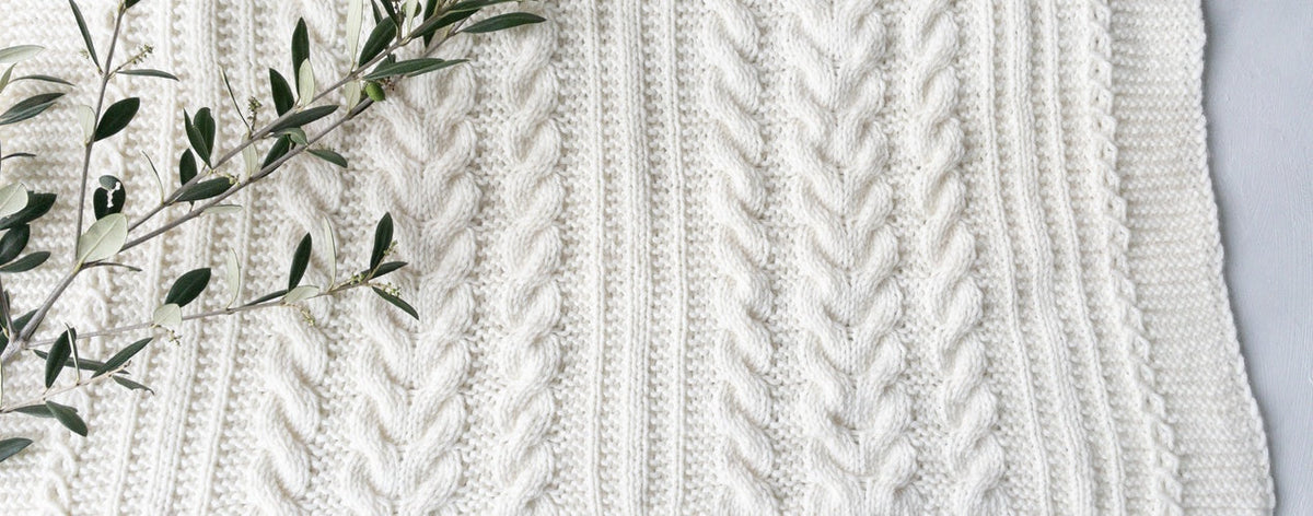 Babydecke mit Zopfmuster