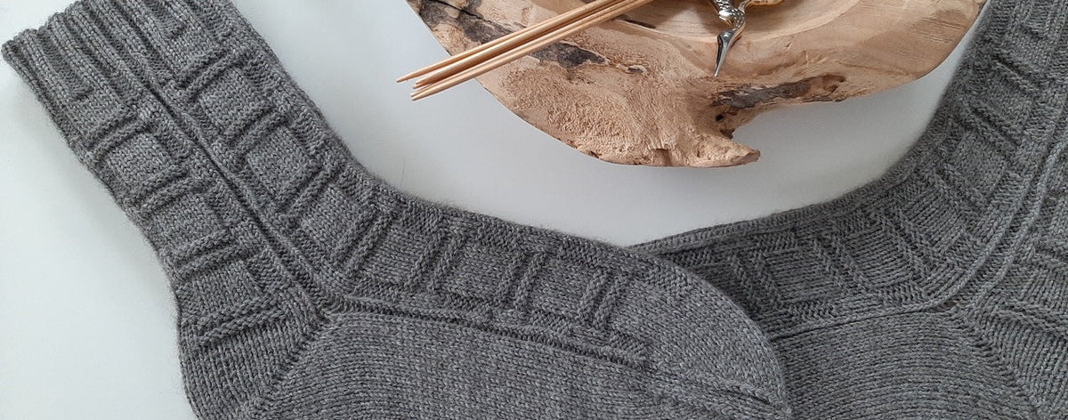 Qualum Socken stricken