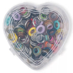 Eyelets with washers, assorted colors, in a heart-shaped box, various sizes