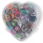 Eyelets with washers, assorted colors, in a heart-shaped box, various sizes