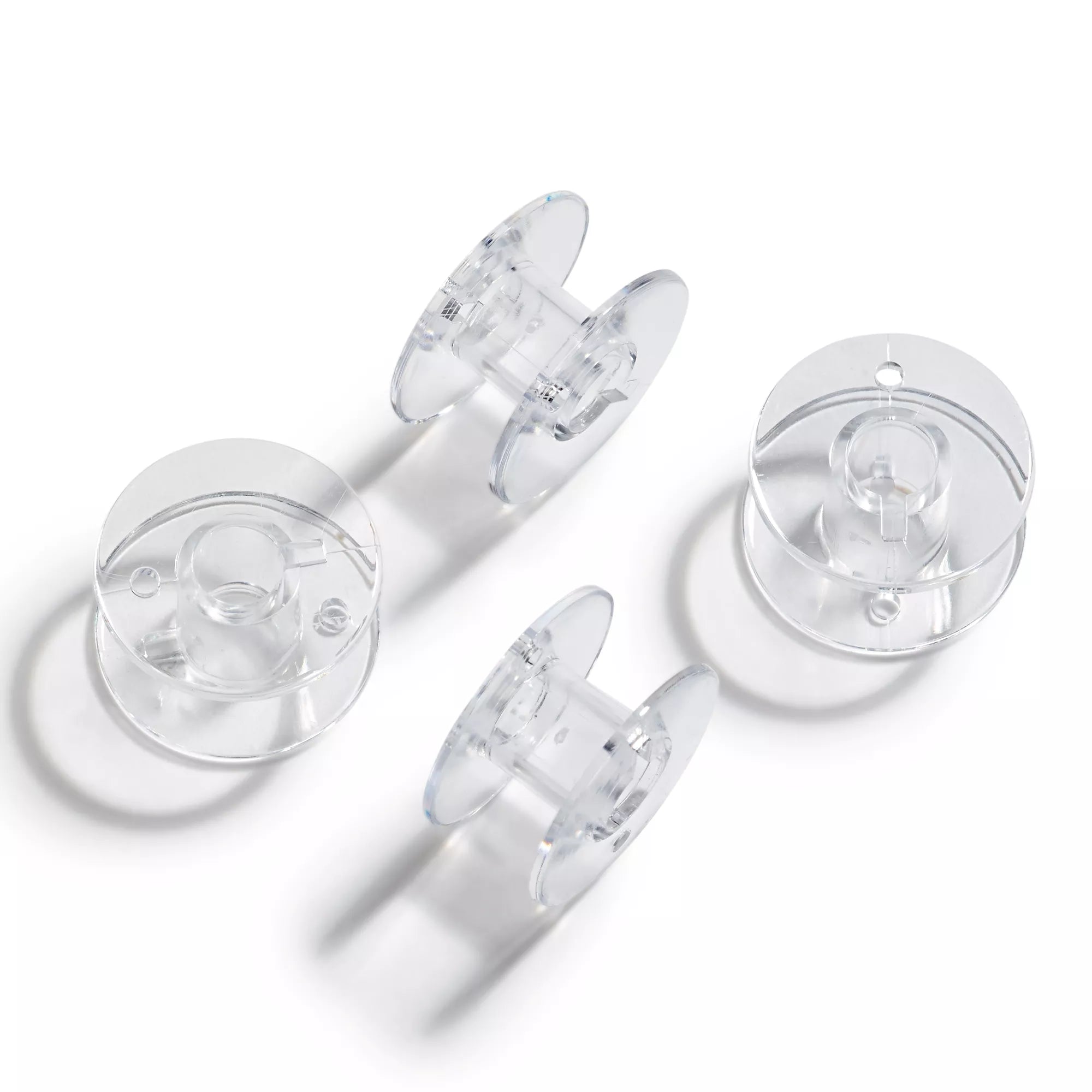 Sewing machine bobbins for horizontal rotary hooks