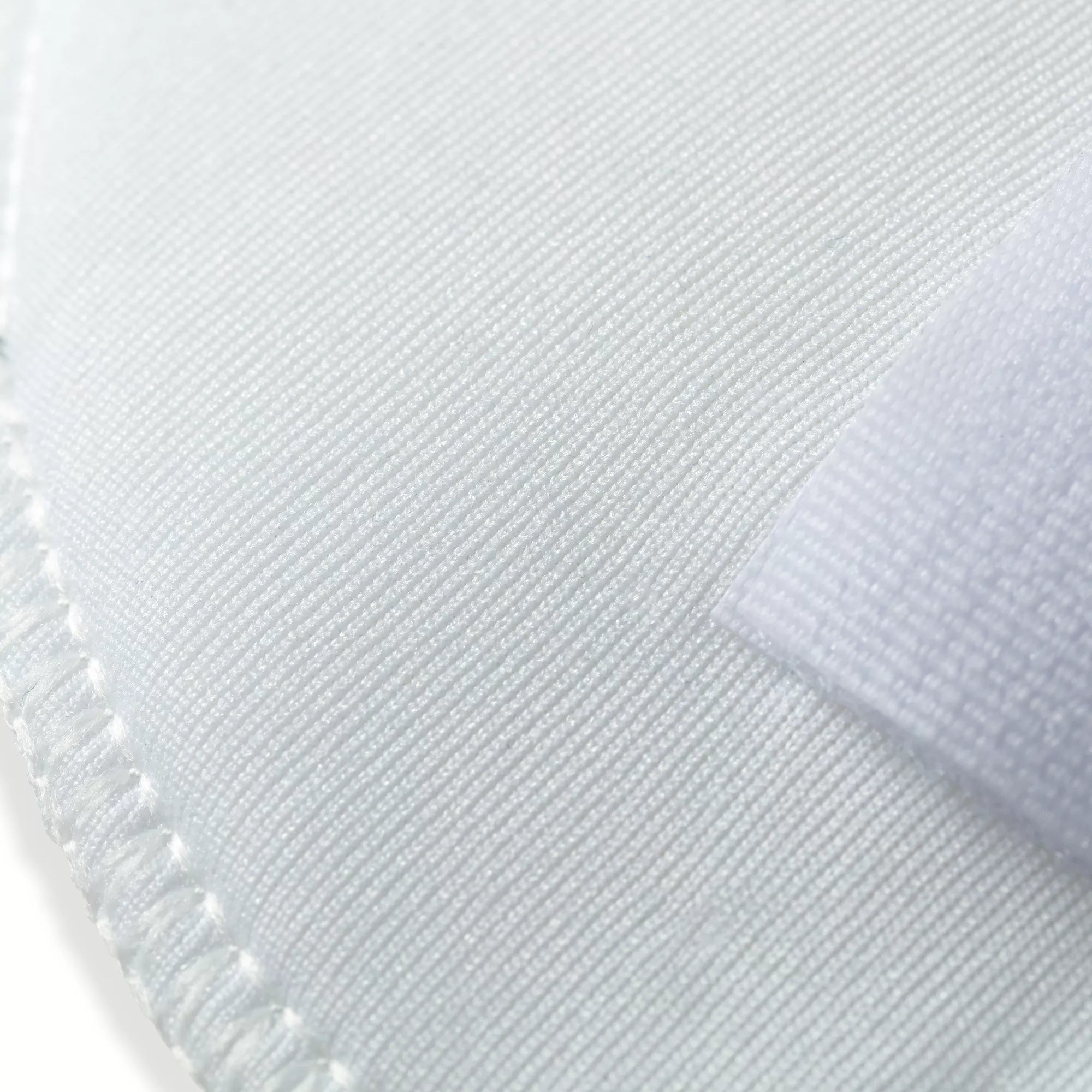 "Raglan" shoulder pads with hook-and-loop fastener