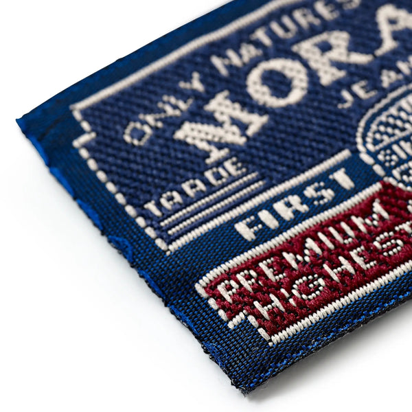 925973|Applikation Label, MORAGO, blau/grau, mehrfarbig
