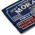 925973|Applikation Label, MORAGO, blau/grau, mehrfarbig