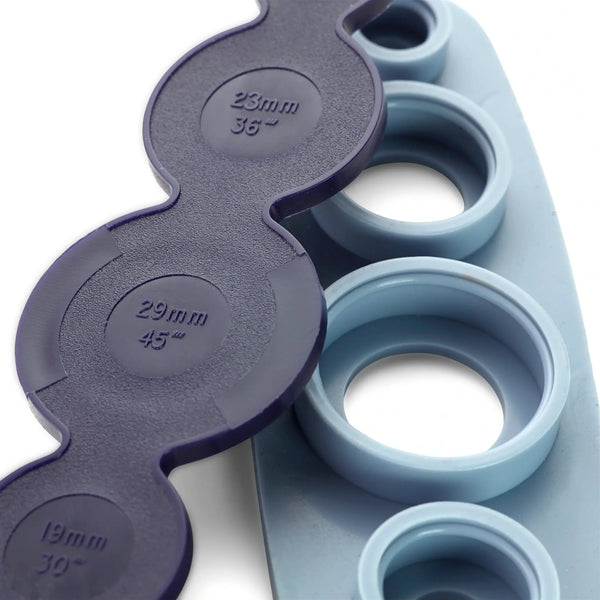 673170|Werkzeug für überziehbare Knöpfe, violett