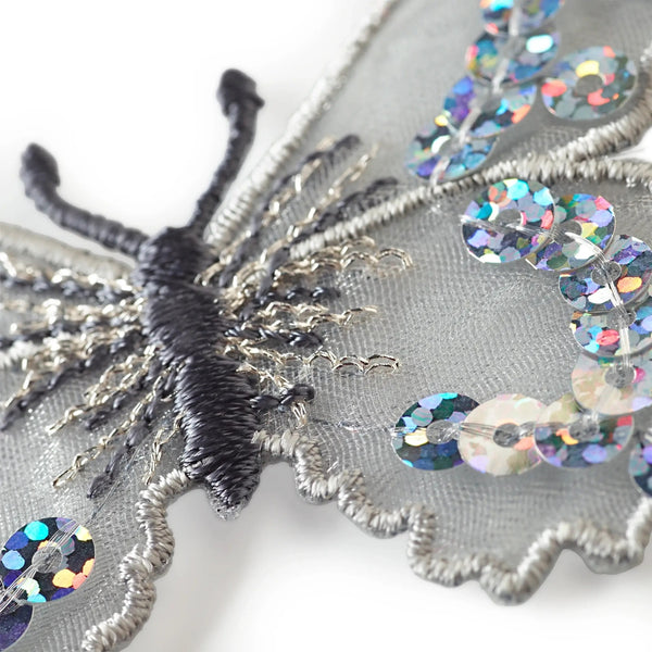 926423|Applikation Schmetterling, silber, mehrfarbig
